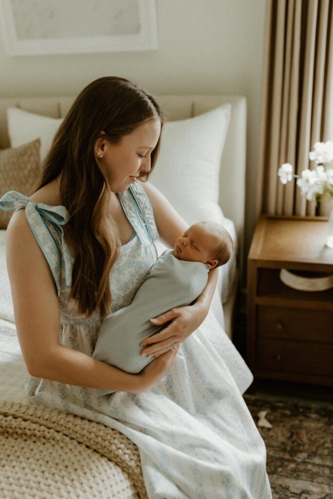 mom and baby in newborn photoshoot