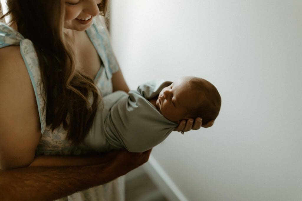 baby peacefully sleeping during his photo session 