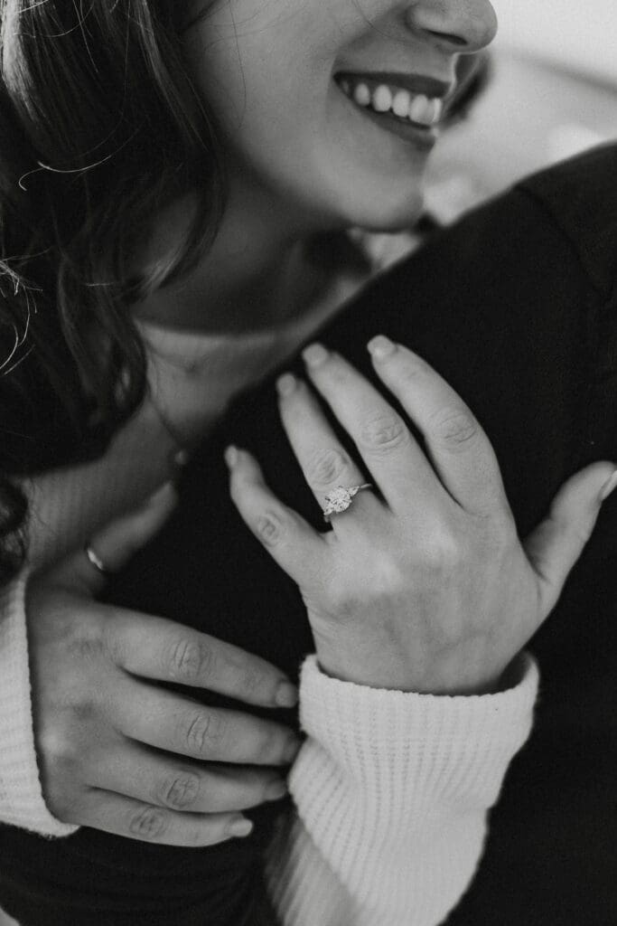 black and white photo of engagement ring