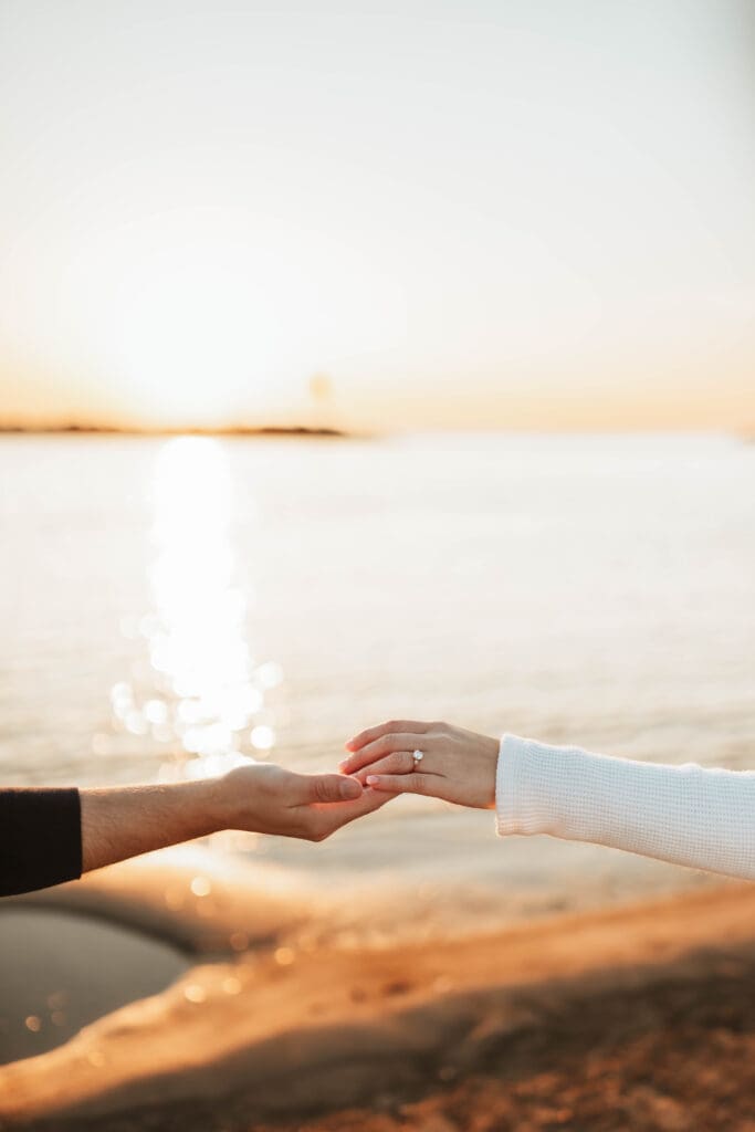 engagement photograph of hands to show off rings during photoshoot