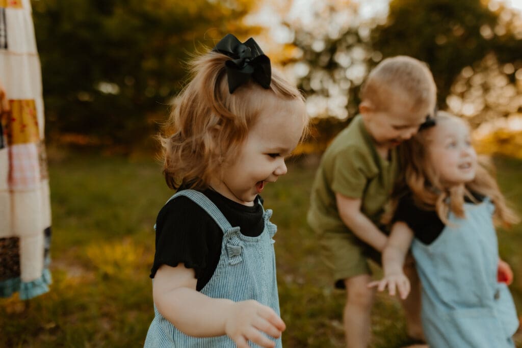young children exploring nature during photo session at Cobus Creek County Park