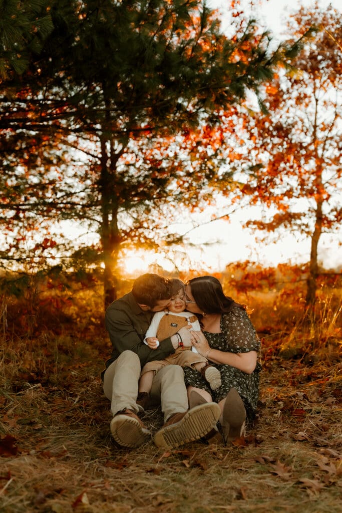 candid photograph of parents and toddler during south bend photoshoot