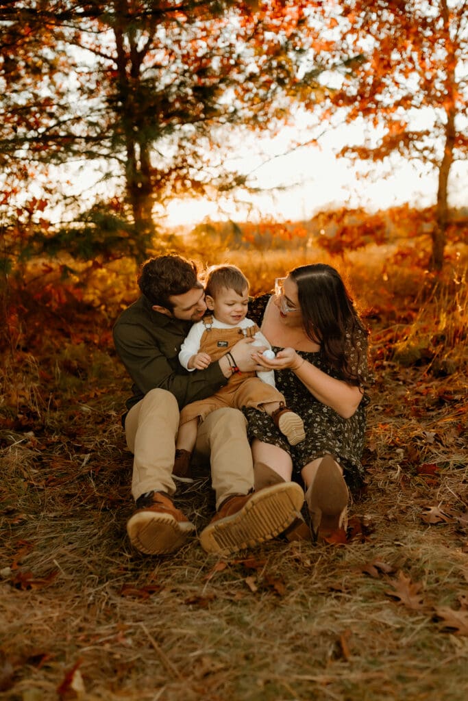 family portrait in the fall during golden hour
