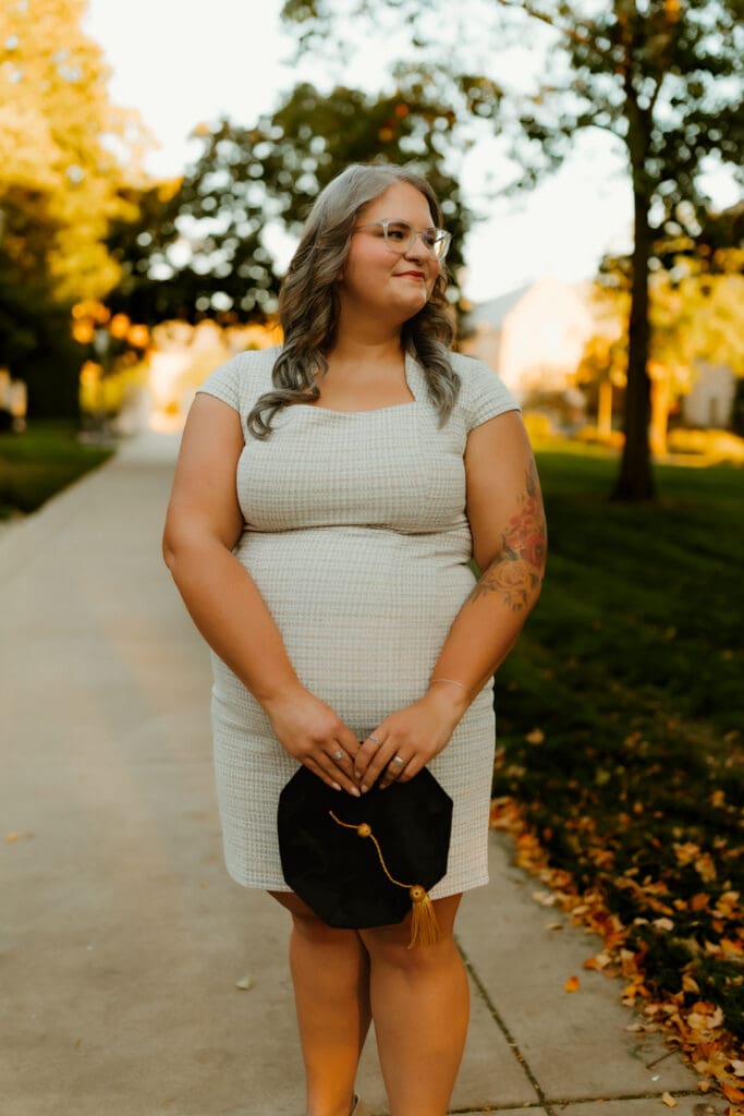 Graduate portraits at Notre Dame with classic stone architecture