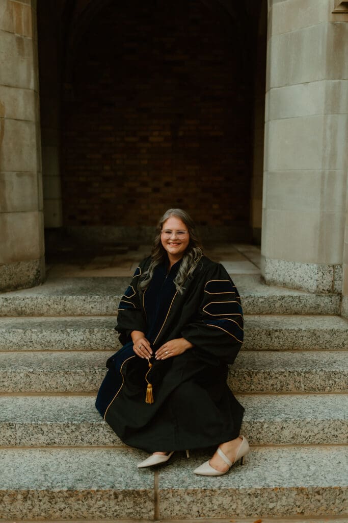 Senior photos at University of Notre Dame lake with soft evening light