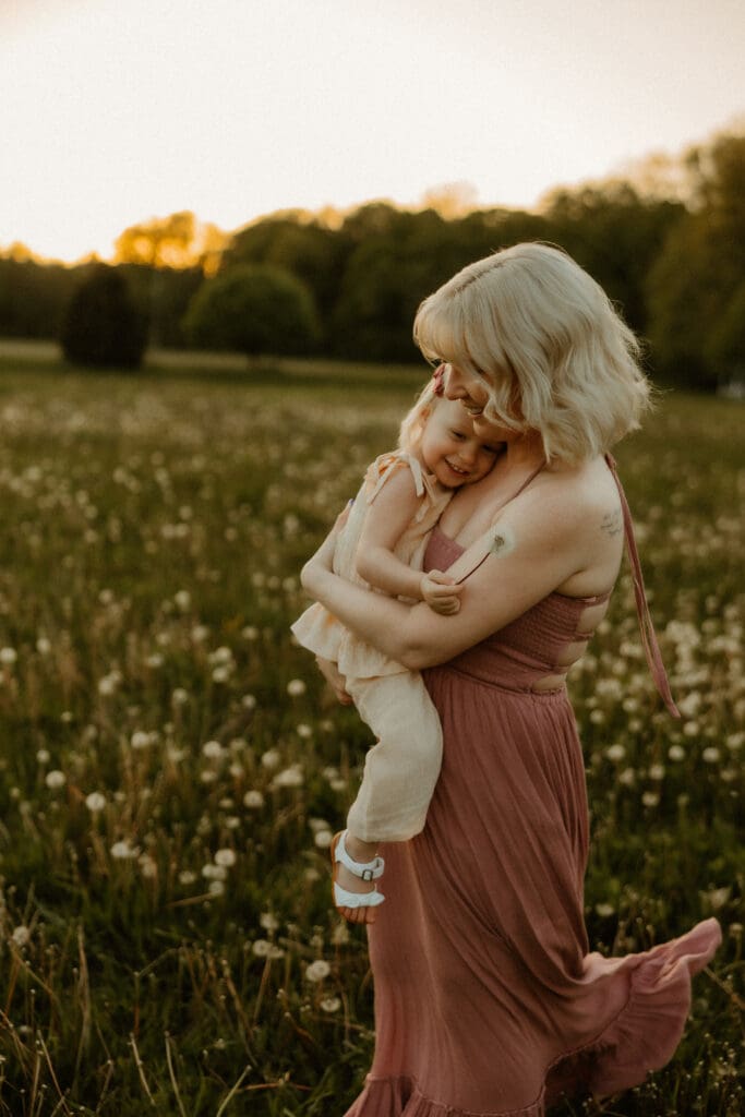 toddler and mom snuggle during south bend photoshoot