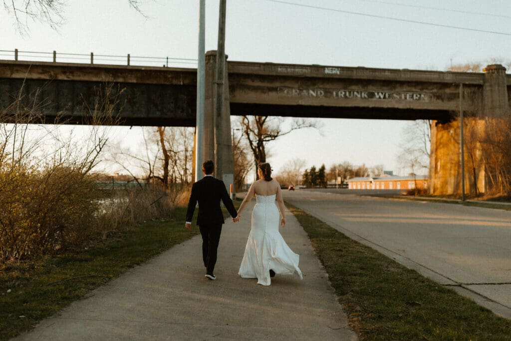 candid photo of bride and groom in south bend street