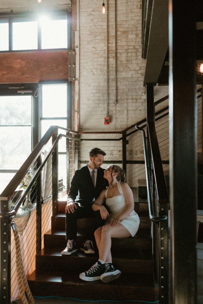 staircase photo of bride and groom during reception