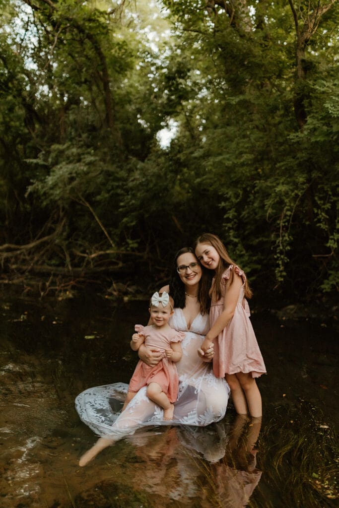 mom and children in creek photo during lifestyle photo session