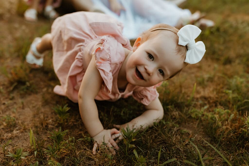 child playing at golden hour during photo session