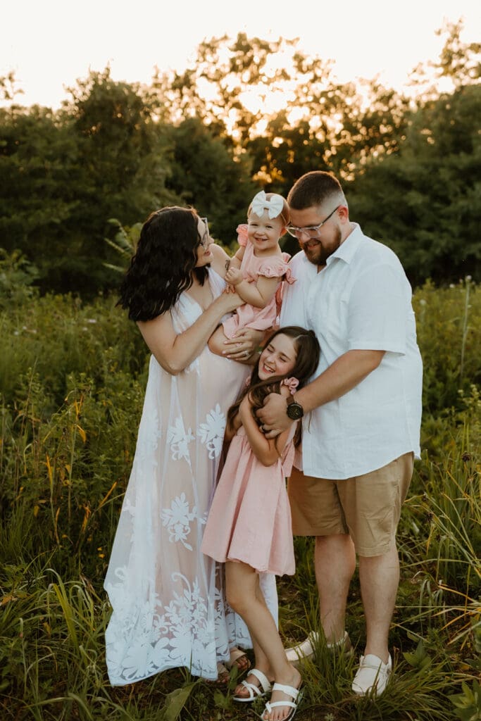 candid photograph of family expecting a new baby in 