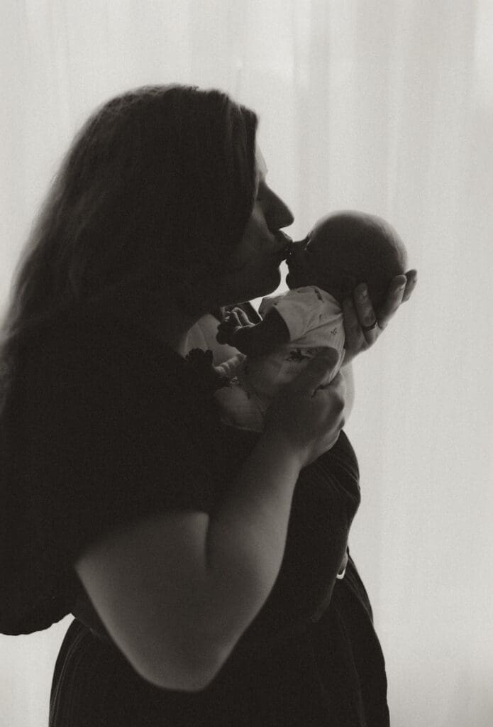 portrait of mother and child in photography studio