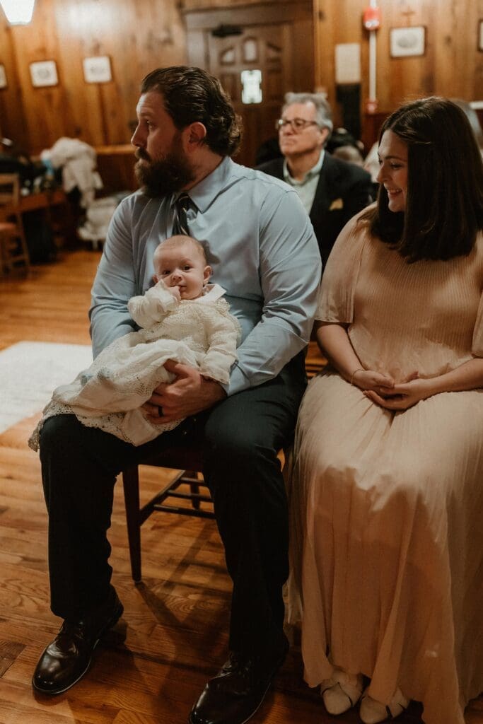 baby photography in log chapel at notre dame baptism