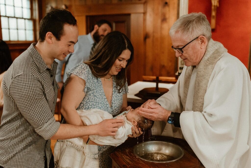 Baptism ceremony photographed at Notre Dame in South Bend Indiana