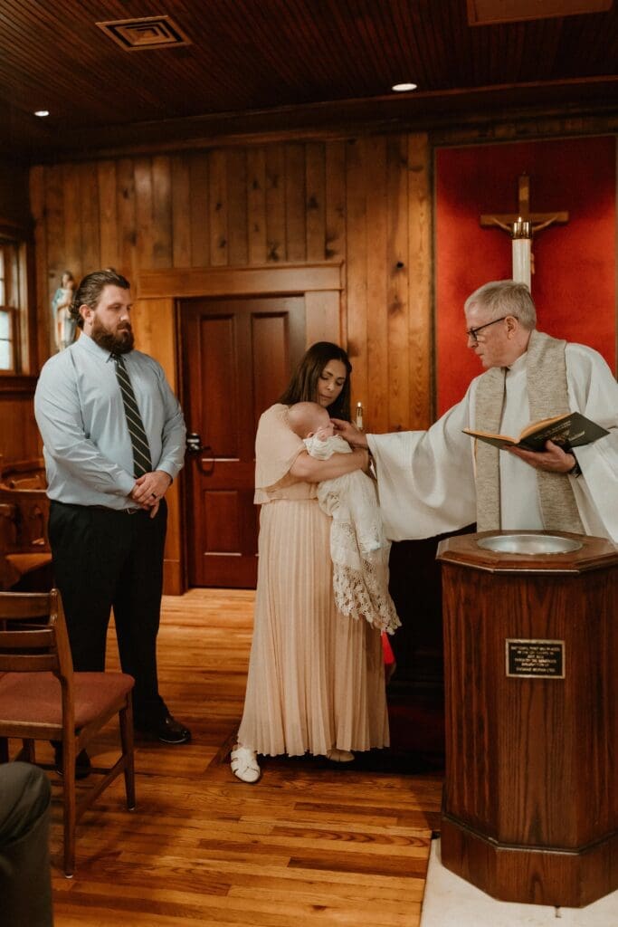 Documentary style baptism photography at Notre Dame