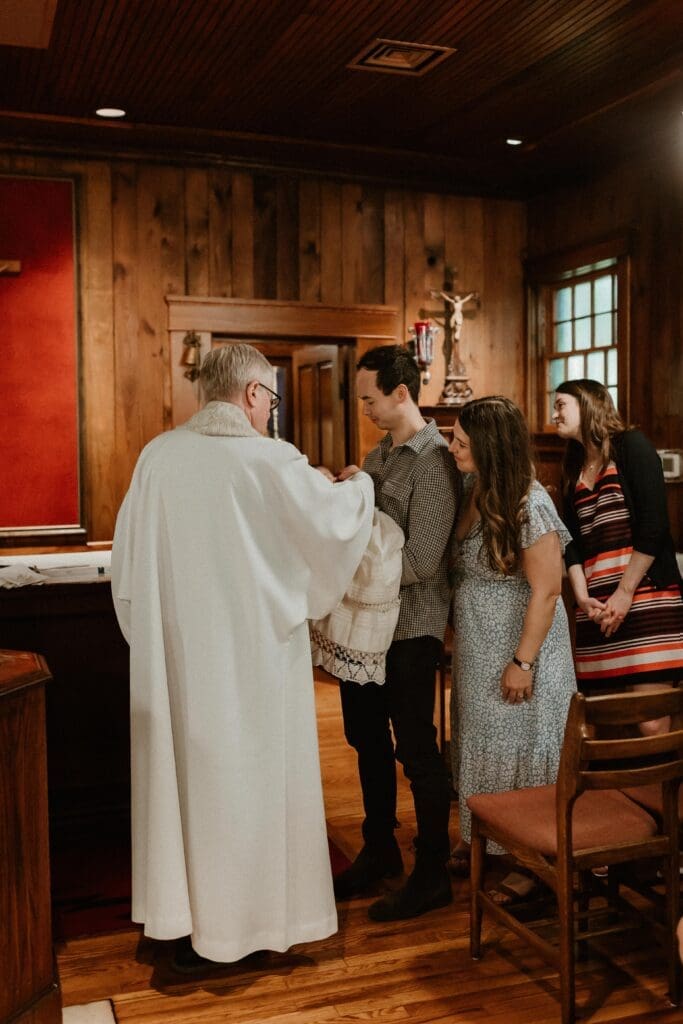 Family portraits inside the Log Chapel at Notre Dame
