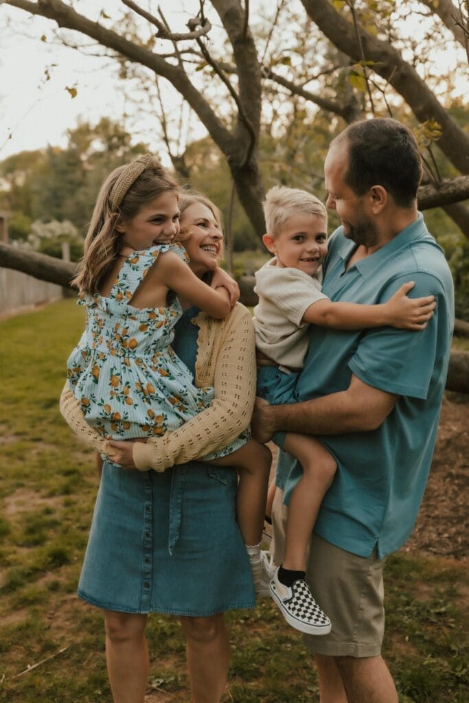 family interacting during family photos in new paris 