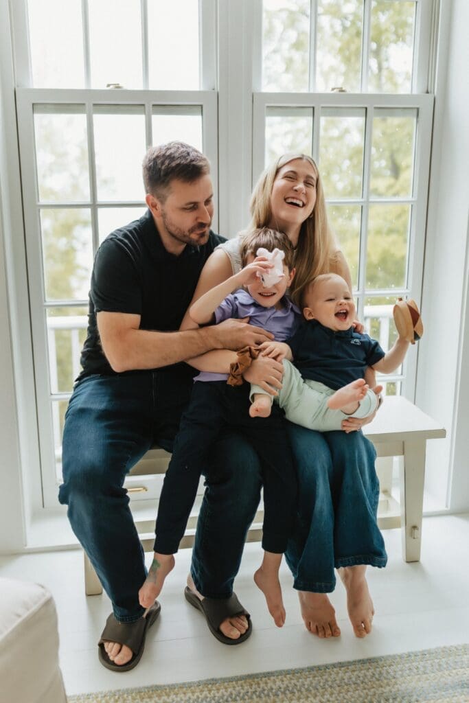candid photograph of family laughing 