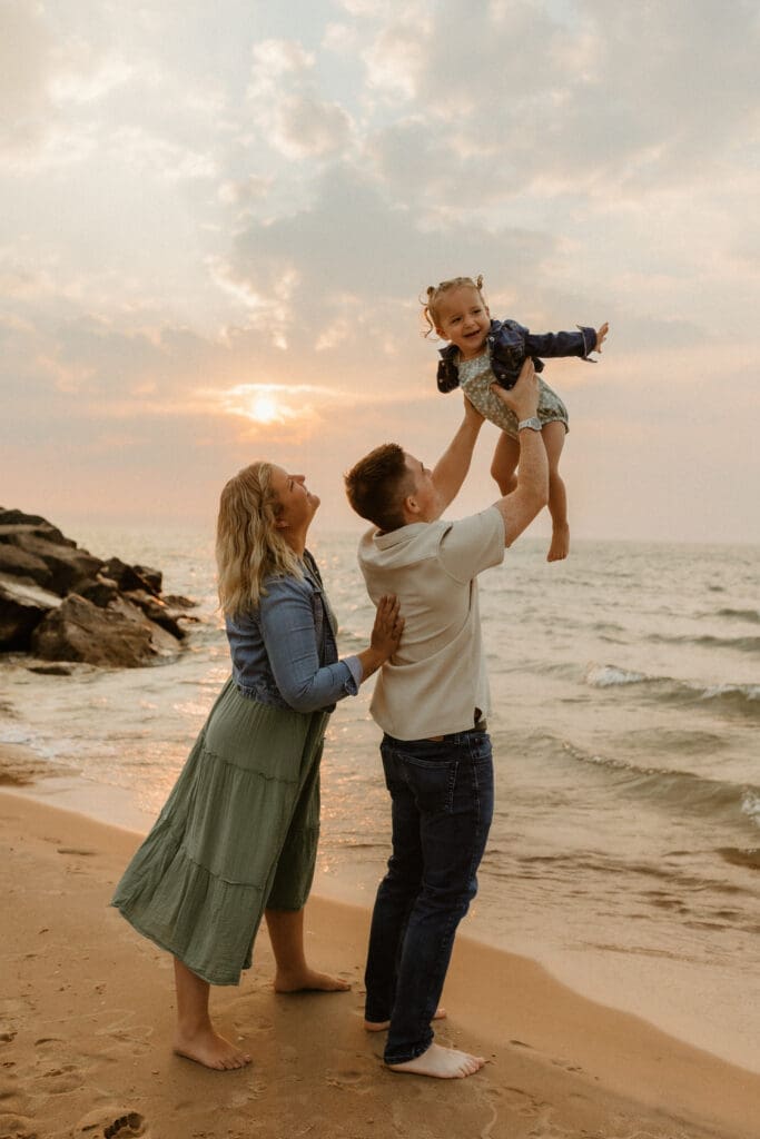 candid family photo during sunset photography session in south haven