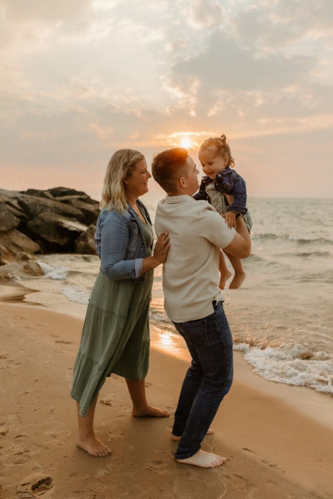 south haven family portrait that is candid and fun with sunset in background