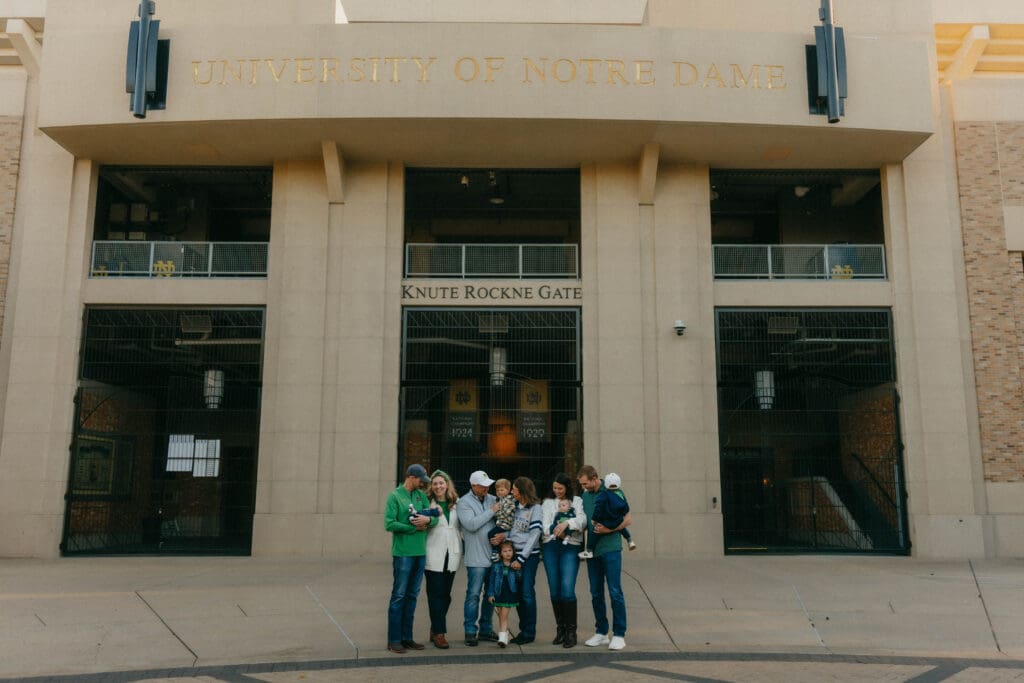 Collage of babies and young children cuddling, laughing, and wearing Notre Dame outfits during a family session.